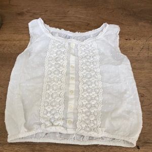 White tank top with some patterns on it